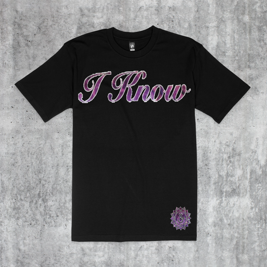 Black t-shirt with the text "I know." printed on it in Amethyst Stone and outlined in white, in a cursive font. The text is centered on the shirt and is large and easy to read.