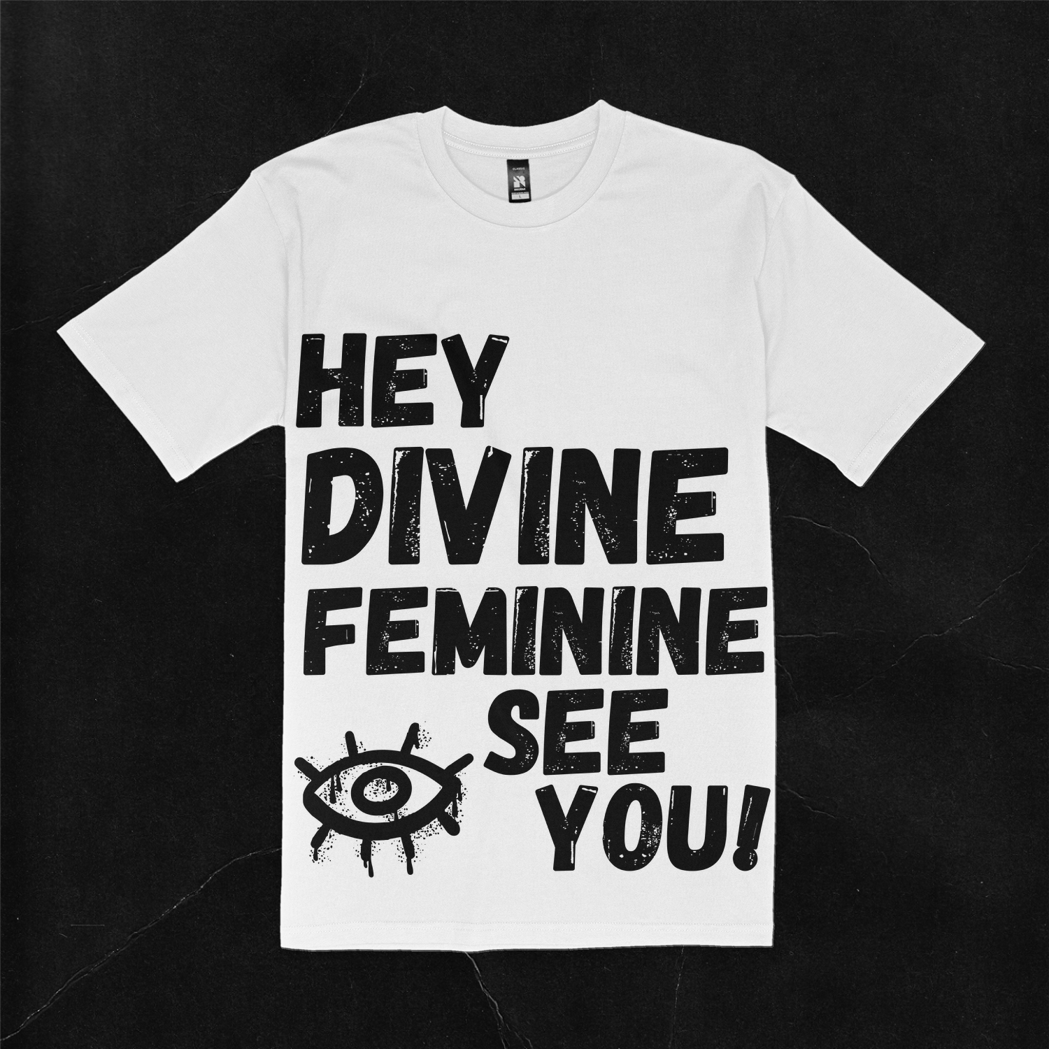  White T-shirt with the text "HEY DEVINE FEMININE I (a picture of an eye) SEE YOU"  written in black