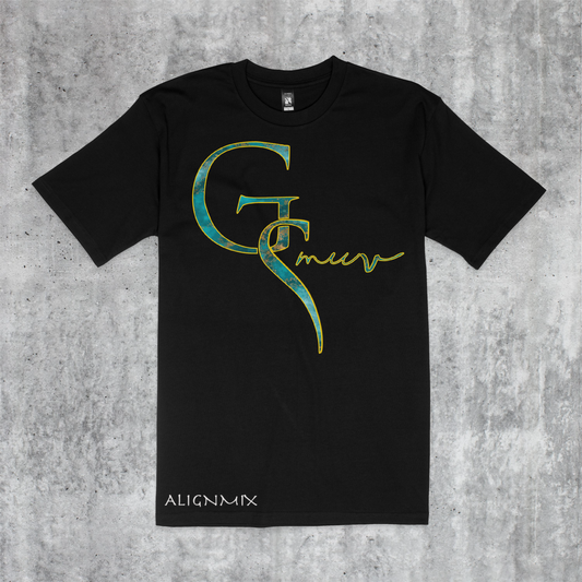 Plain black t-shirt with GSMUV logo outlined in gold made with turquoise crystal stone with white Alignmix written at the bottom on a gray black and white gradient stone background 