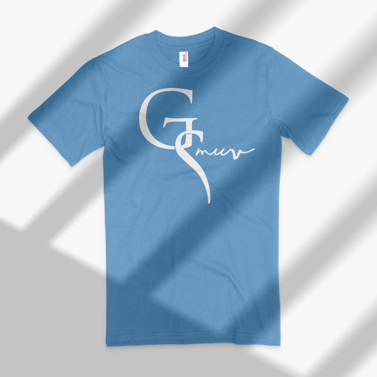 Clean baby blue t-shirt with a white GSMUV logo on it with a white background